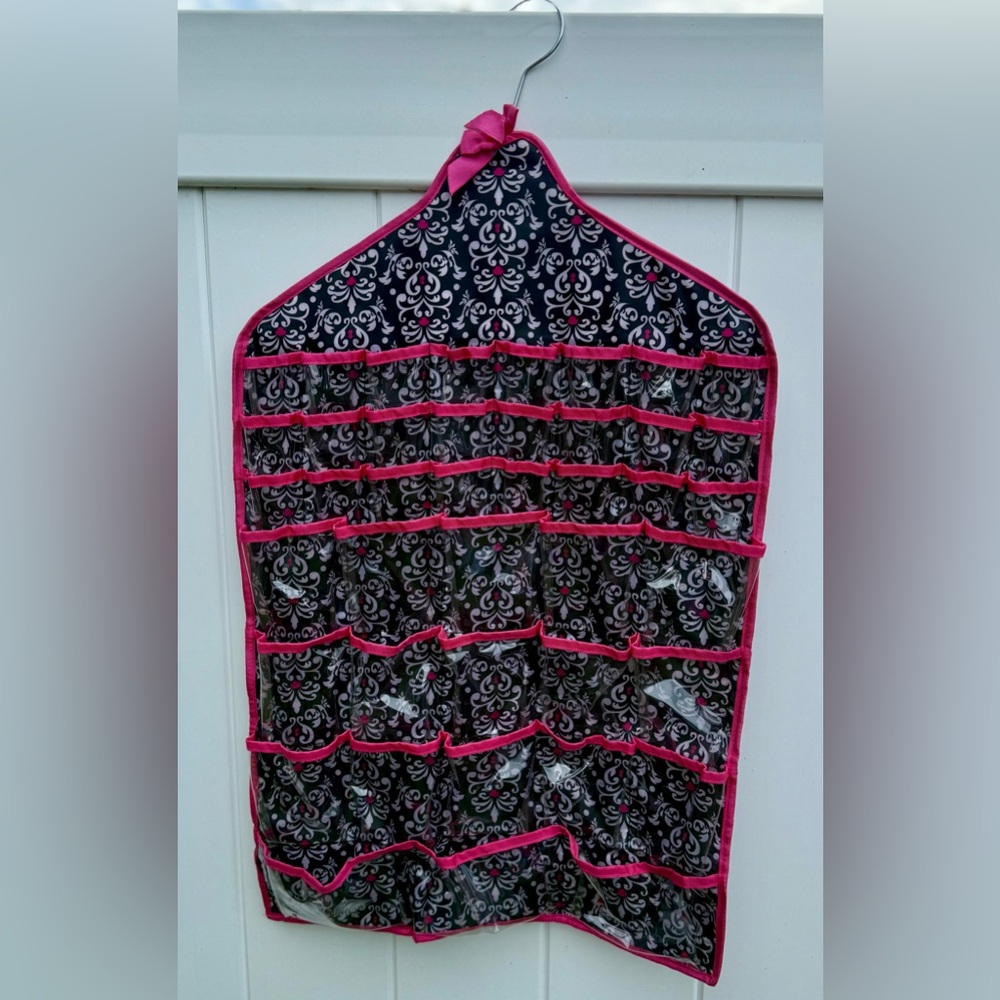 Hanging Jewelry Organizer W/Multiple Different Size Pockets.  Black & Pink. EUC.
